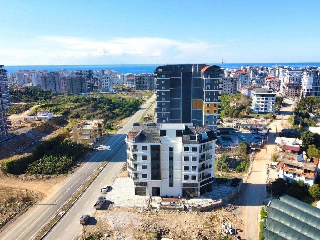 Квартира в новом комплексе планировкой 1+1 55м район Махмутлар Аланья. - Фото 3