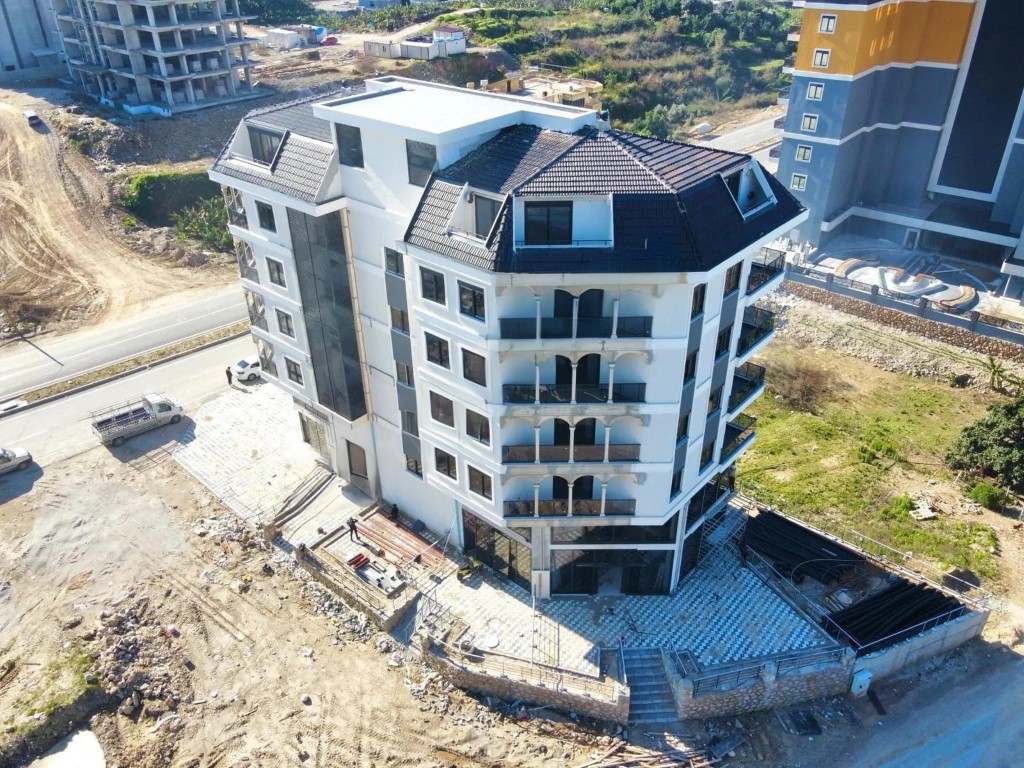 Квартира в новом комплексе планировкой 1+1 55м район Махмутлар Аланья. - Фото 2