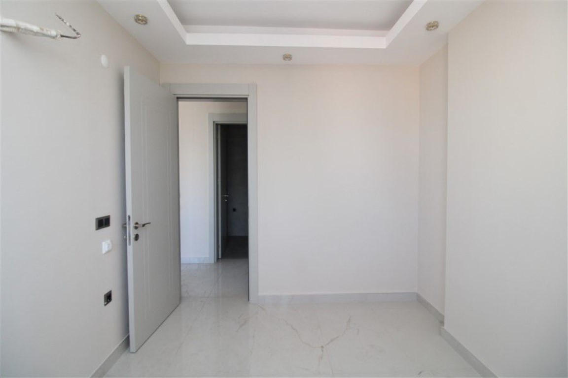 Квартира в новом жилом комплексе в шаговой доступности от моря район Махмутлар Аланья.  - Фото 20