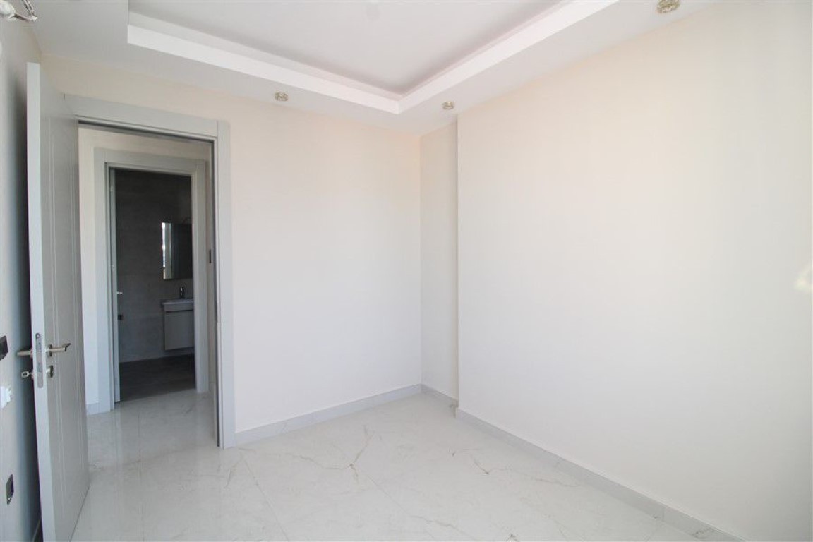 Квартира в новом жилом комплексе в шаговой доступности от моря район Махмутлар Аланья.  - Фото 22