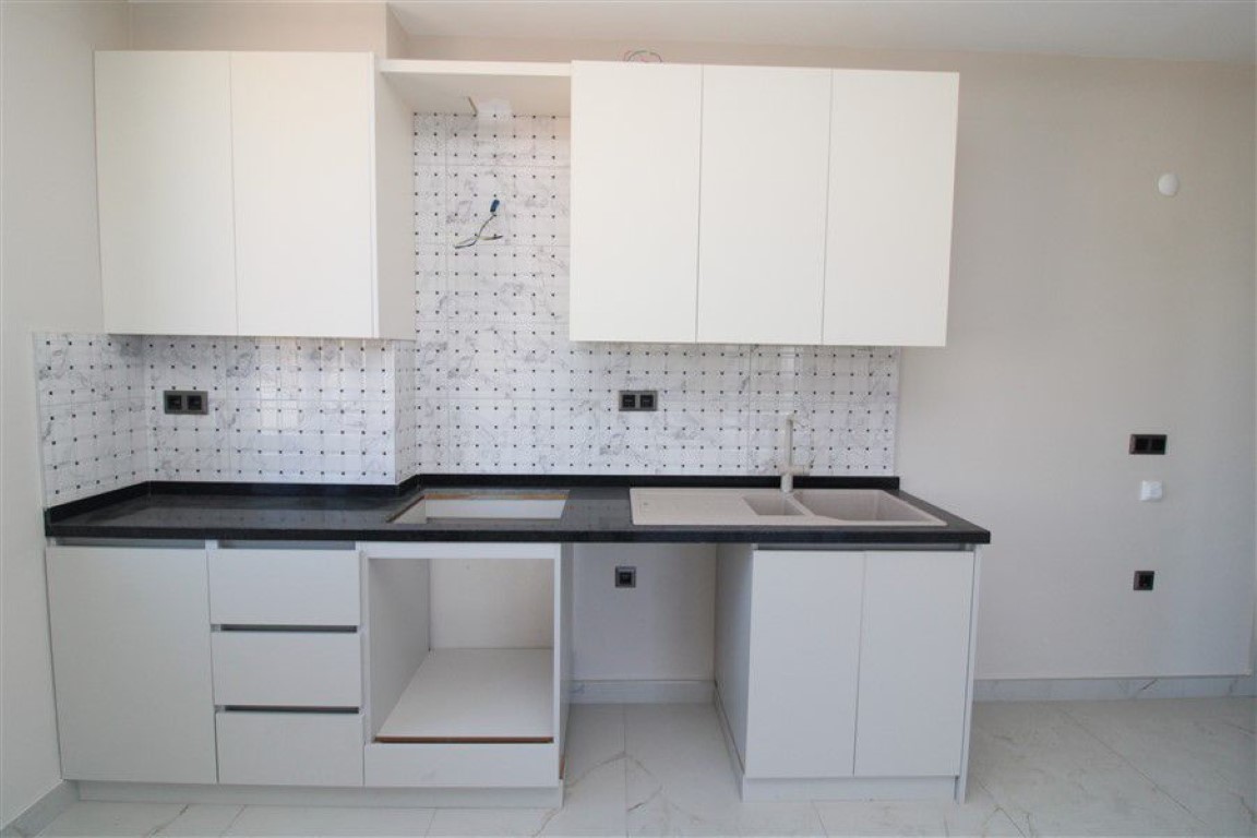 Квартира в новом жилом комплексе в шаговой доступности от моря район Махмутлар Аланья.  - Фото 15