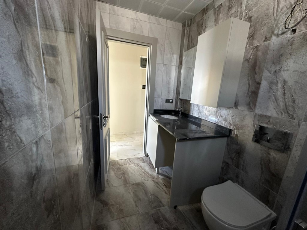 Двухкомнатная квартира 60м с видом на море район Тосмур Аланья. - Фото 14