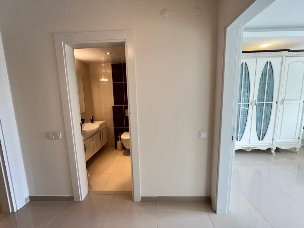 Шикарный мебилированный садовый дуплекс район Каргыджак Аланья.  - Фото 11