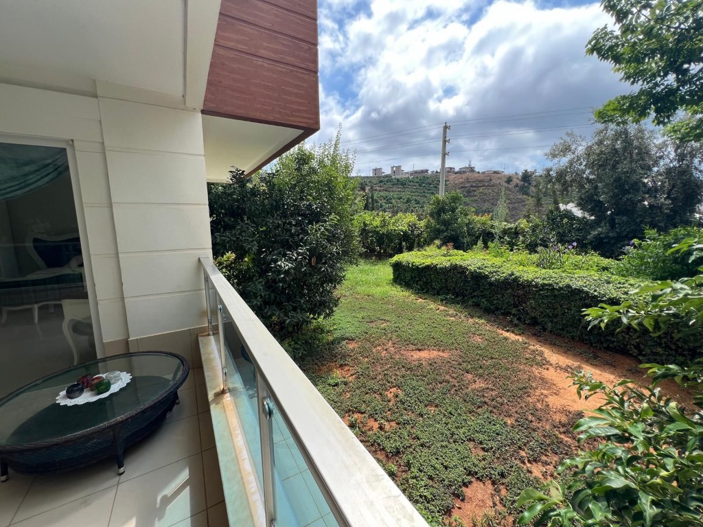 Шикарный мебилированный садовый дуплекс район Каргыджак Аланья.  - Фото 17