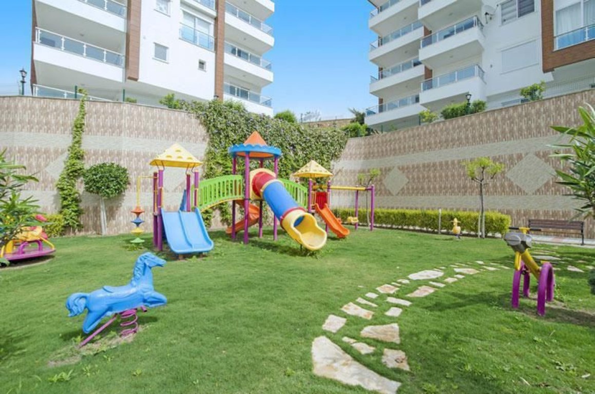 Шикарный мебилированный садовый дуплекс район Каргыджак Аланья.  - Фото 47