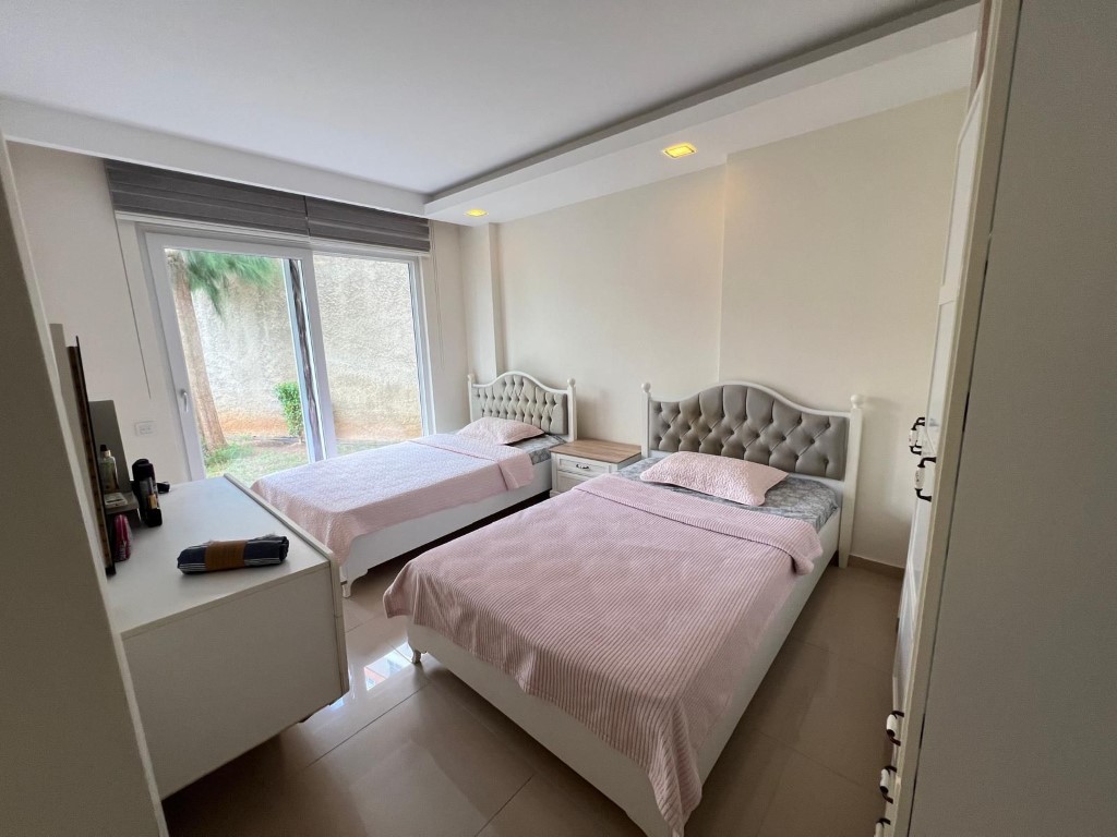 Шикарный мебилированный садовый дуплекс район Каргыджак Аланья.  - Фото 28