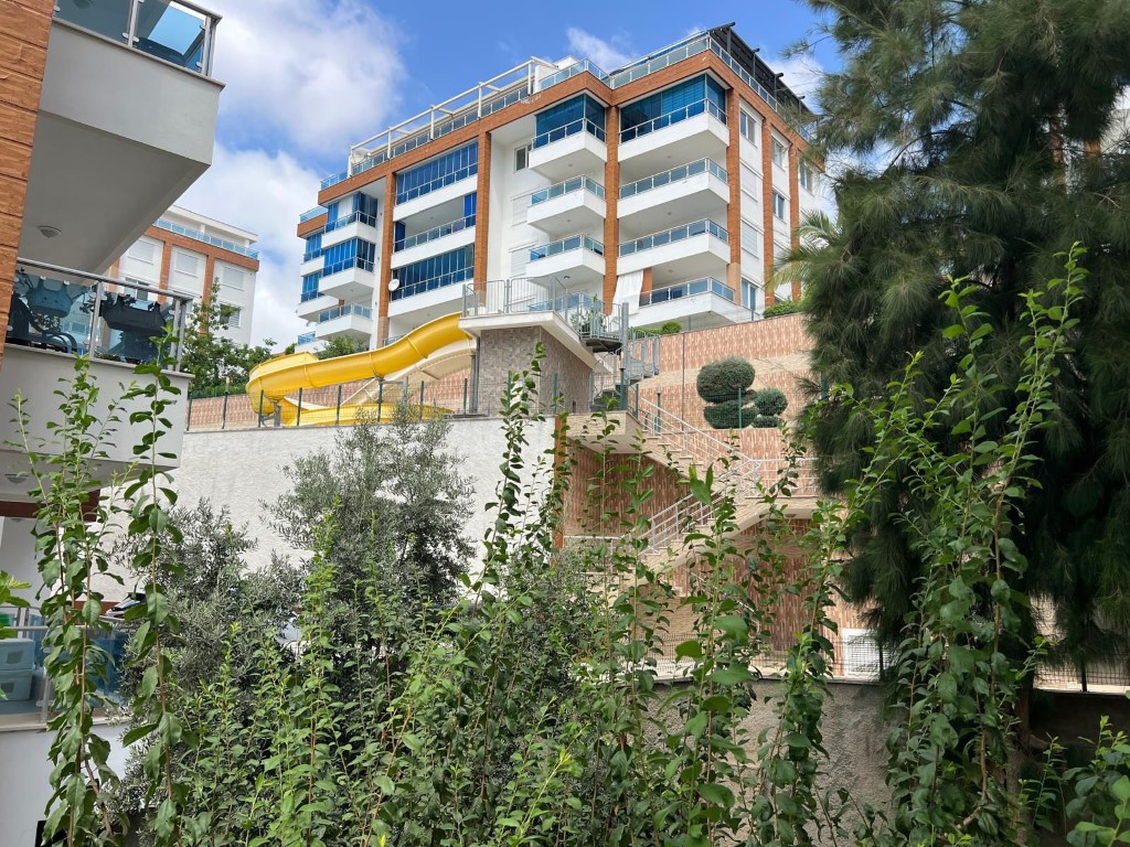 Шикарный мебилированный садовый дуплекс район Каргыджак Аланья.  - Фото 48