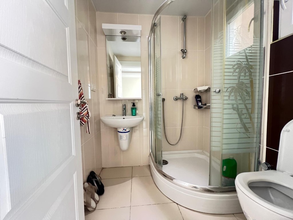 Шикарный мебилированный садовый дуплекс район Каргыджак Аланья.  - Фото 32