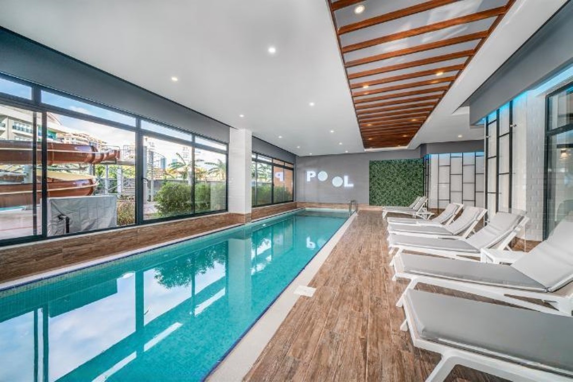 Просторная мебелированная квартира в современном комплексе район Оба Аланья. - Фото 16