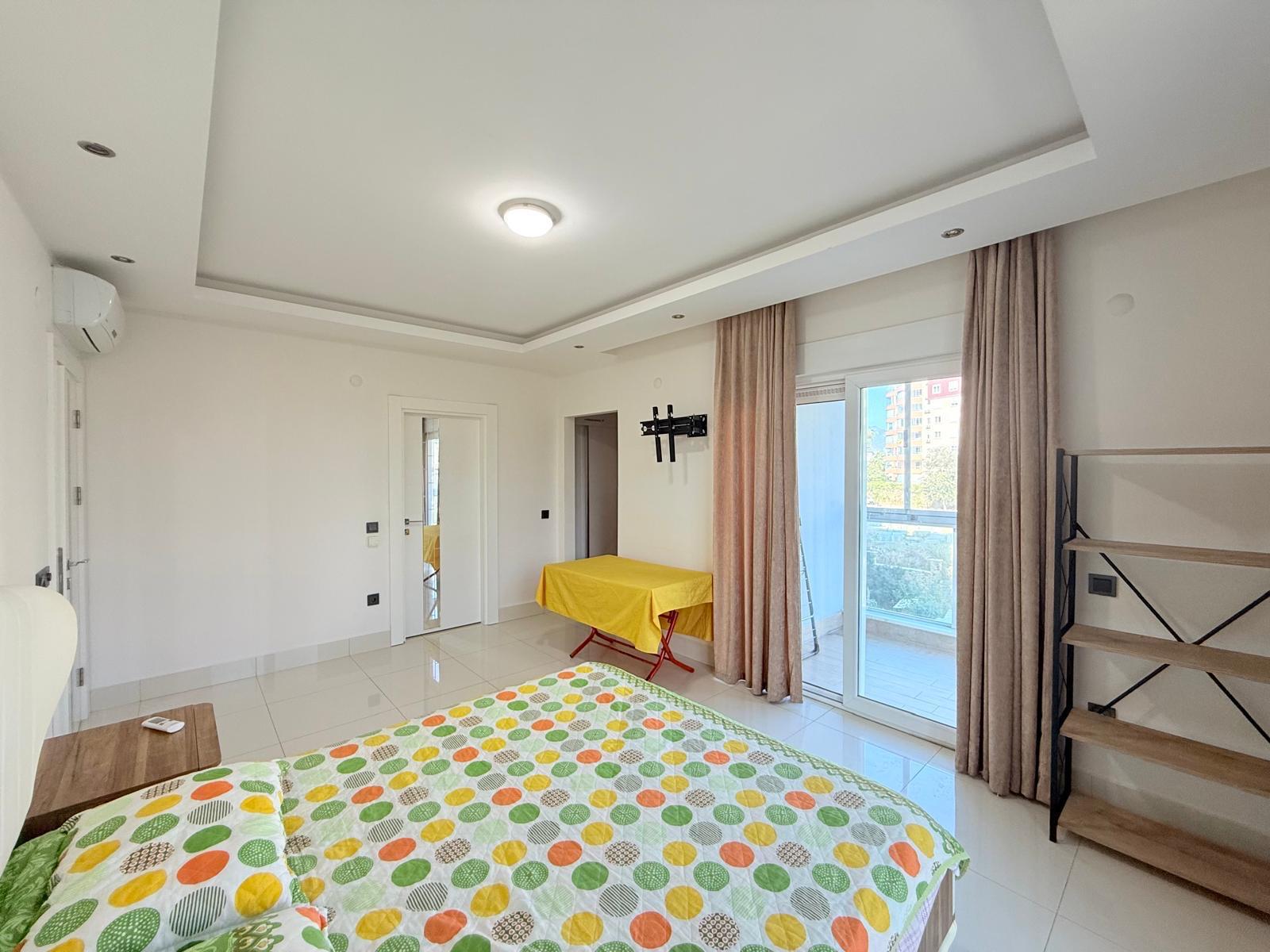 Меблированные апартаменты 2+1 в районе Тосмур — 110 м², 250 м до моря - Фото 12