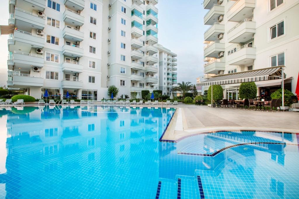 Просторный меблированный пентхаус 4+1 в 150 метрах от моря в Тосмуре - Фото 10